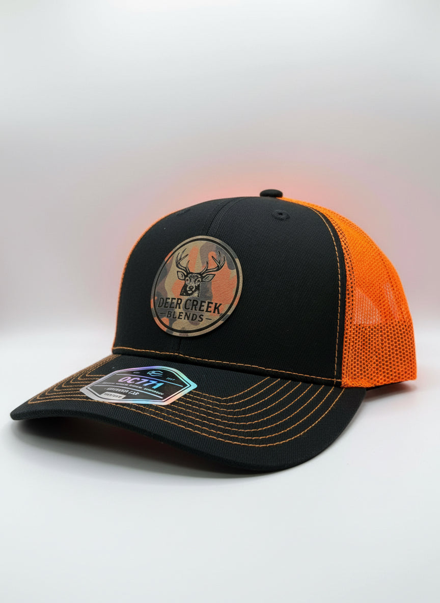 OG Logo CAMO Leather Patch Trucker Hat- Hunters Orange/Black