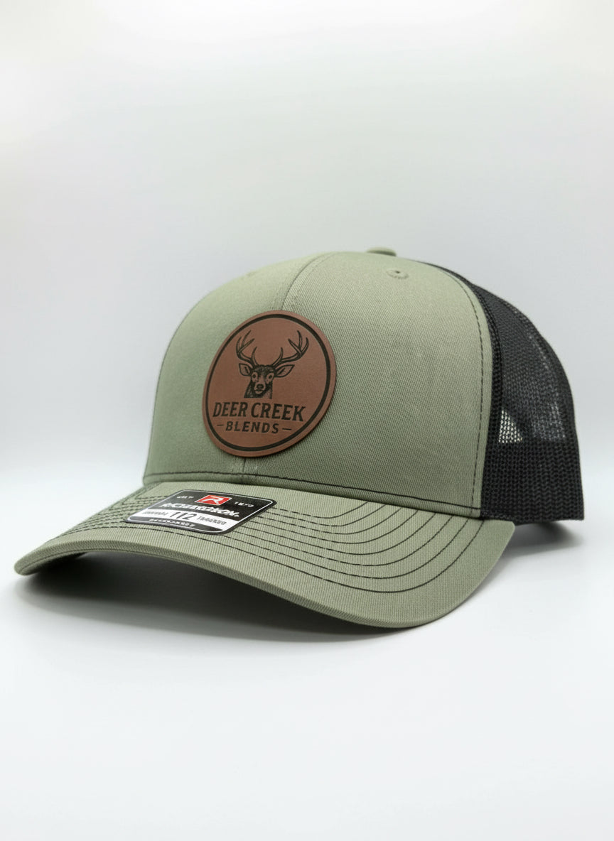 OG Logo Leather Patch Trucker Hat- Loden/Black