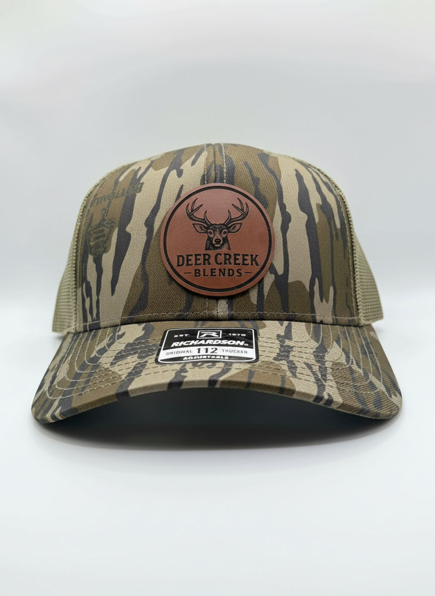 OG Logo Leather Patch Trucker Hat- Mossy Oak Bottomland™